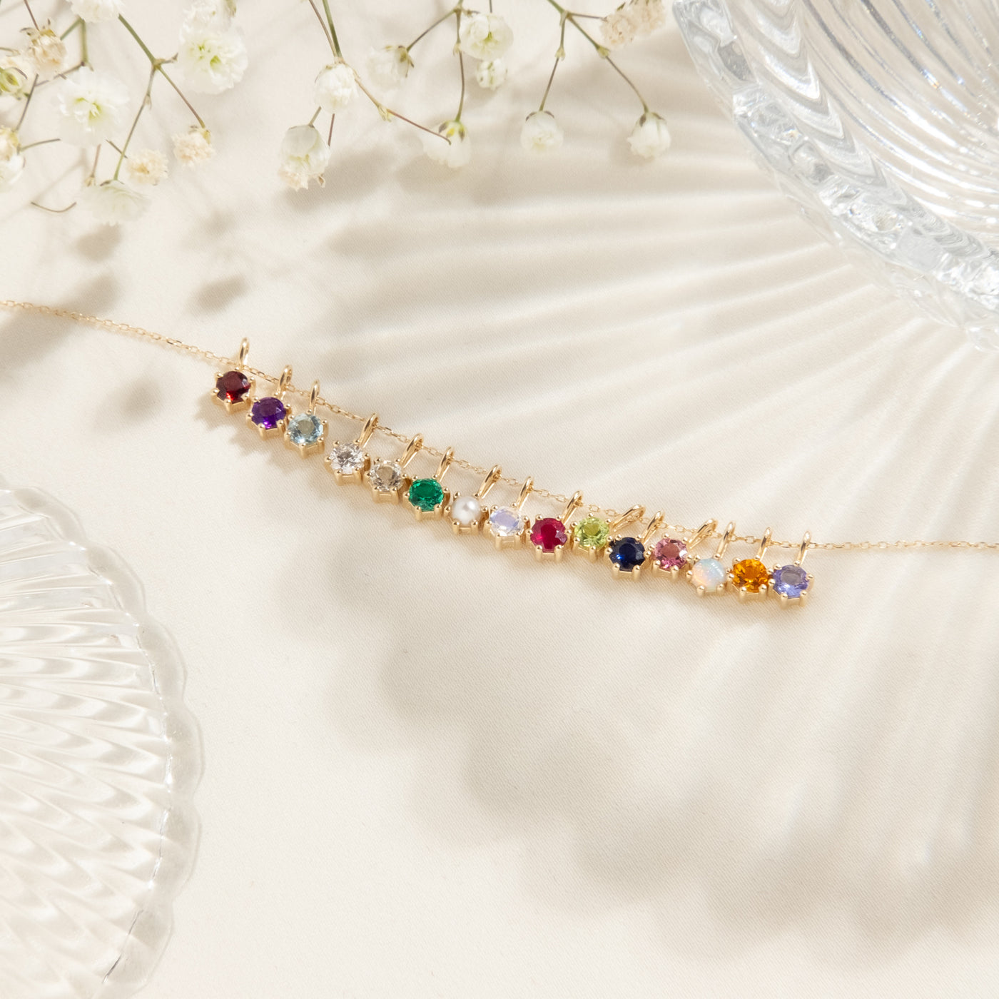 January - Garnet February - Amethyst March - Aquamarine April - White Topaz April - Diamond May - Emerald June - Pearl June - Moonstone July - Ruby August - Peridot September - Sapphire October - Australian Opal October - Pink Tourmaline November - Citrine December - Tanzanite 14k Birthstone Charm Necklace