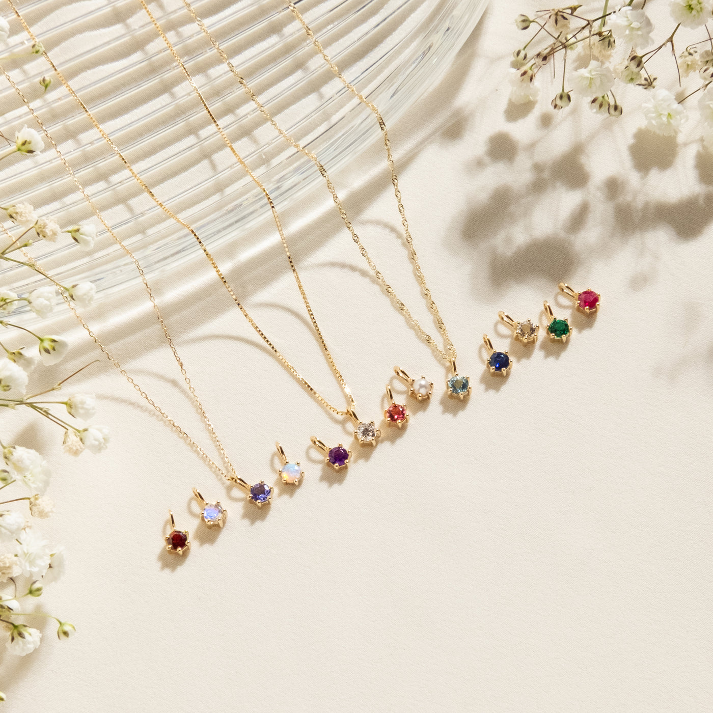 January - Garnet February - Amethyst March - Aquamarine April - White Topaz April - Diamond May - Emerald June - Pearl June - Moonstone July - Ruby August - Peridot September - Sapphire October - Australian Opal October - Pink Tourmaline November - Citrine December - Tanzanite 14k Birthstone Charm Necklace