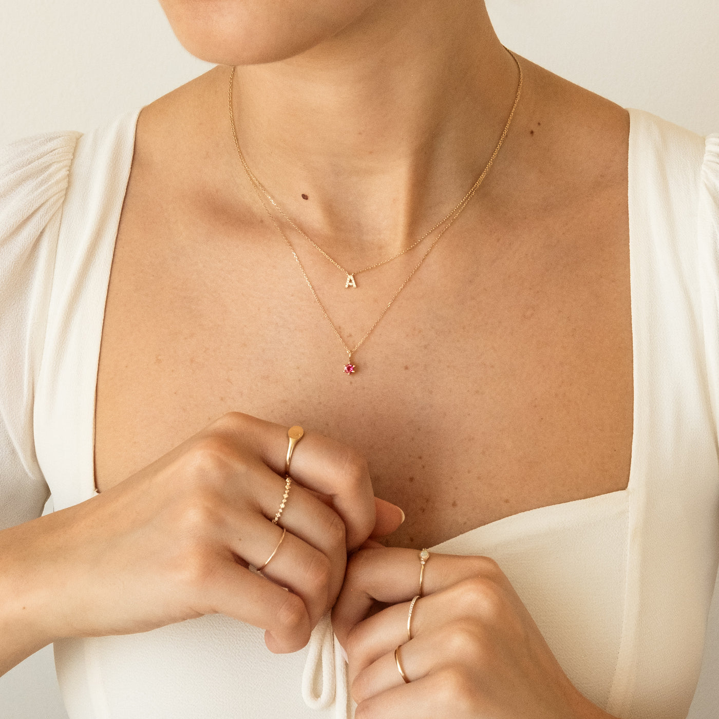 January - Garnet February - Amethyst March - Aquamarine April - White Topaz April - Diamond May - Emerald June - Pearl June - Moonstone July - Ruby August - Peridot September - Sapphire October - Australian Opal October - Pink Tourmaline November - Citrine December - Tanzanite 14k Birthstone Charm Necklace