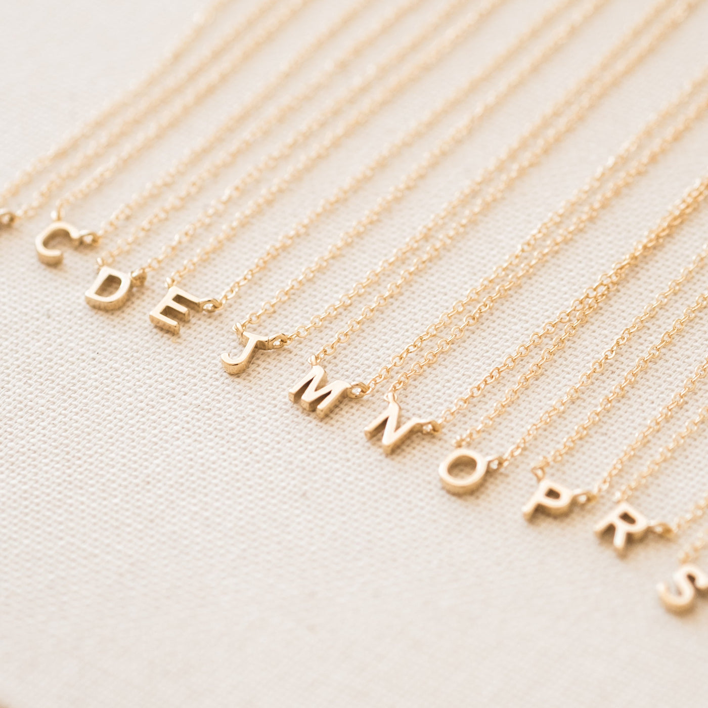 A B C D E F G H I J K L M N O P Q R S T U V W X Y Z Tiny Initial Necklace