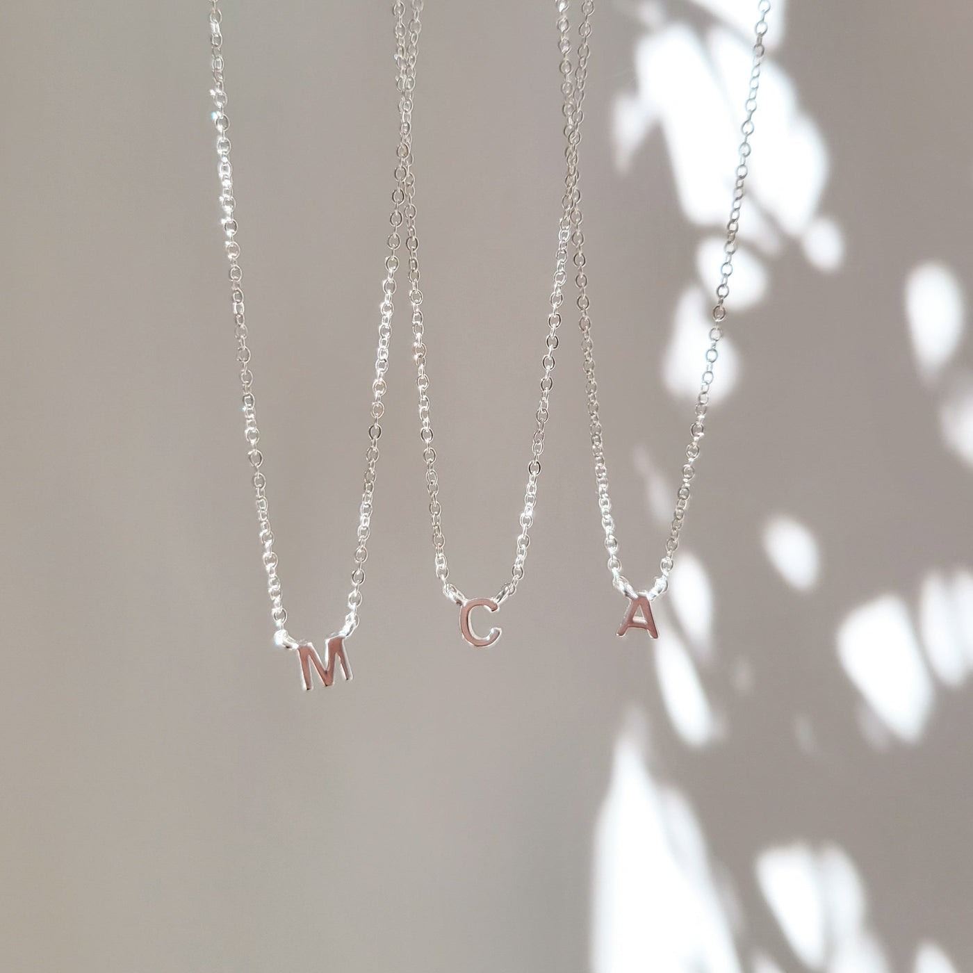 A B C D E F G H I J K L M N O P Q R S T U V W X Y Z Tiny Initial Necklace